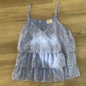Sienna Sky light periwinkle blue sleeveless blouse. Size medium
